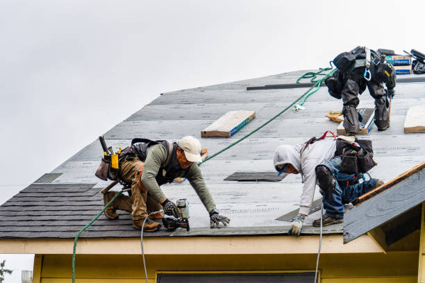Professional Gutter Installation technician working in Terryville, NY